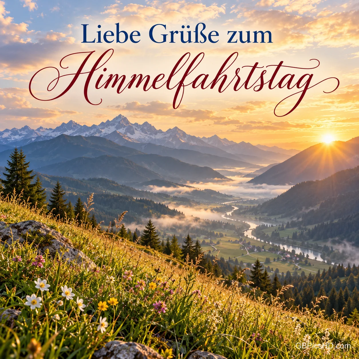 Blick über ein nebliges Bergtal bei Sonnenaufgang mit Blumenwiese im Vordergrund und dem Gruß "Liebe Grüße zum Himmelfahrtstag". Blick über ein nebliges Bergtal bei Sonnenaufgang mit Blumenwiese im Vordergrund und dem Gruß "Liebe Grüße zum Himmelfahrtstag".