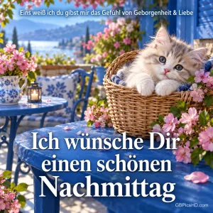Ein Kätzchen liegt im Korb auf einer blühenden Terrasse mit dem Gruß "Ich wünsche Dir einen schönen Nachmittag".