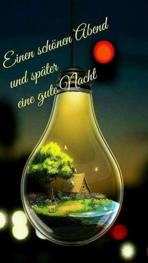 Glühbirne mit Miniaturlandschaft und Abendgruß in deutscher Sprache.
