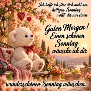 Ein weißer Teddybär mit roter Schleife sitzt unter rosa Blüten auf einer Bank mit "Einen schönen Sonntag wünsche ich dir".
