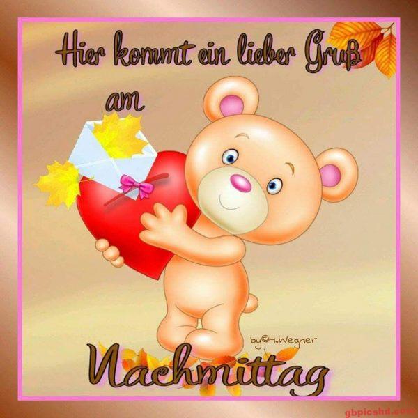 Niedlicher Teddybär mit Herz und Brief, herbstlicher Nachmittaggruß