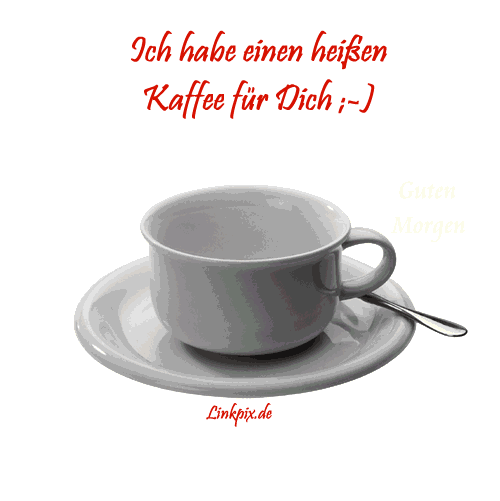 Weißer Kaffeebecher mit Unterteller und Löffel als freundlicher Morgengruß.