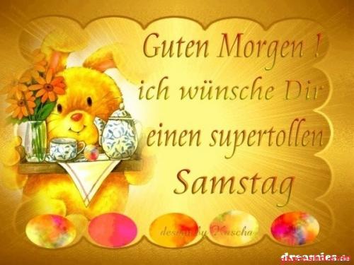 Gelber Kuscheltier-Hase mit Blumen und Teetasse, morgendlicher Gruß für einen schönen Samstag.