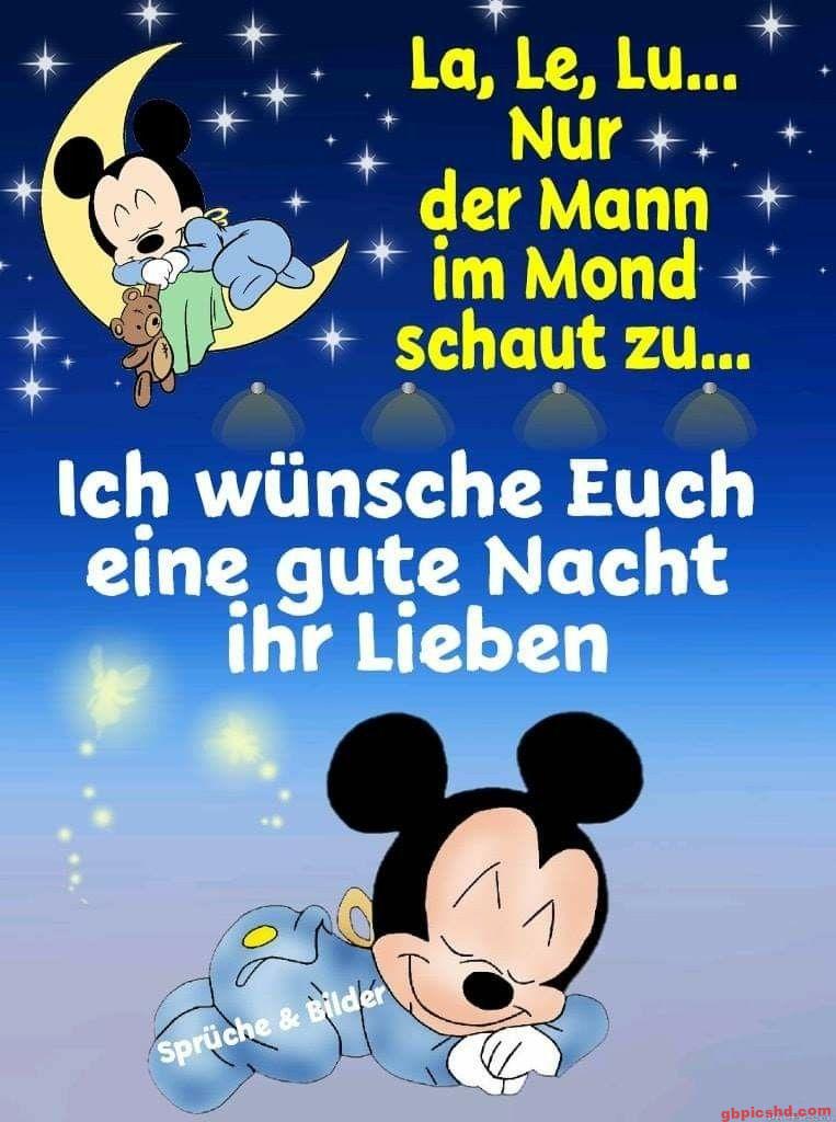 Mickey Mouse schläft auf dem Mond und wünscht eine gute Nacht, Sternenhintergrund.