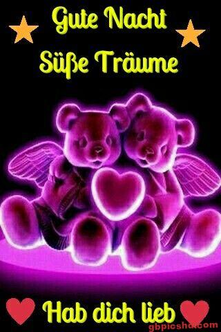 Zwei Teddybären mit Flügeln und Herz leuchten rosa in der Nacht, liebevolle Gute-Nacht-Wünsche.