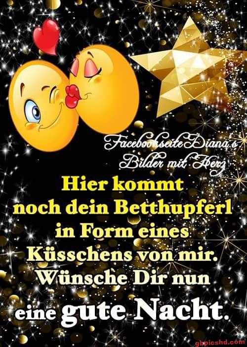 Zwei Smileys bei Nacht mit einem Kuss, um eine gute Nacht zu wünschen.