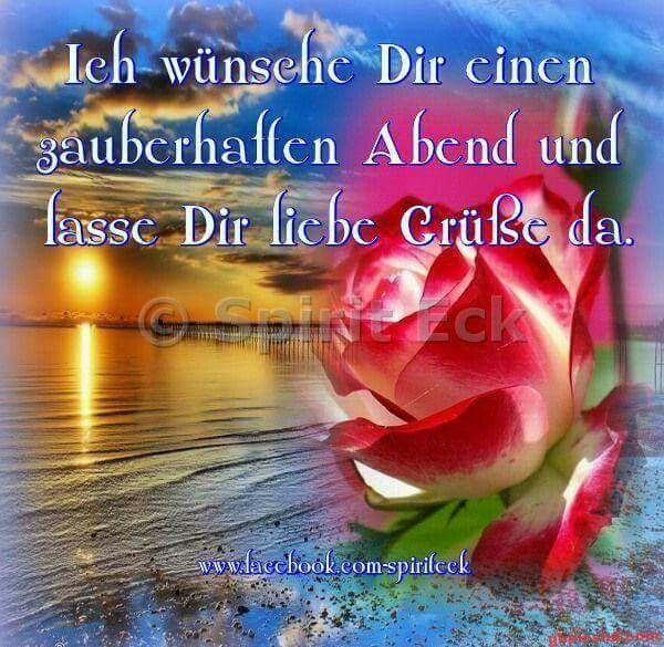 Romantische Abendstimmung mit Sonnenuntergang und einer Rose als Grußmotiv.