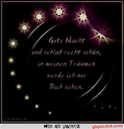 Leuchtende Sterne vor dunklem Hintergrund mit einem guten Nacht Gruß auf Deutsch.