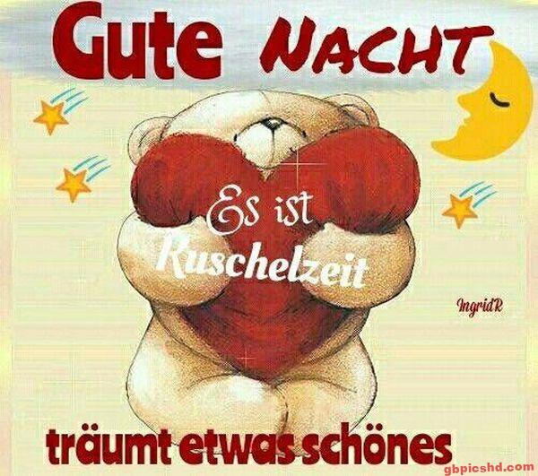 Niedlicher Teddy mit Herz sagt Gute Nacht und Kuschelzeit, umgeben von Sternen und Mond.