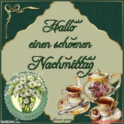 Grußkarte mit Blumenstrauß und Tee, die einen schönen Nachmittag wünscht.