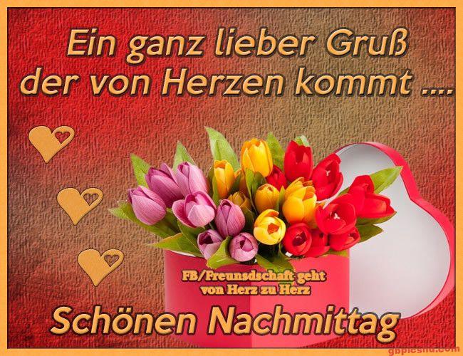 Bunter Tulpenstrauß in herzförmiger Box zum Gruß für einen schönen Nachmittag.