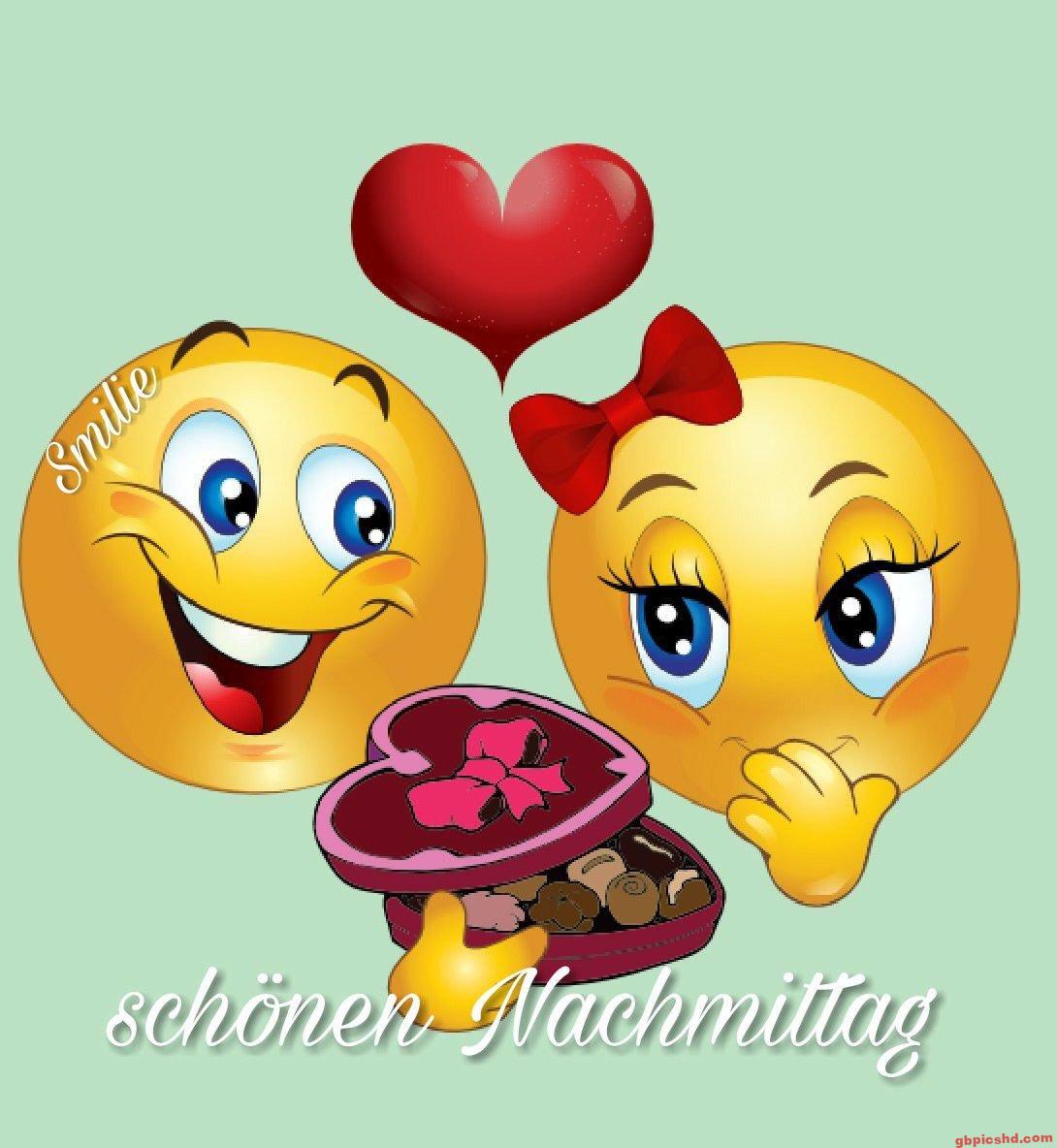 Zwei Smileys mit Herz und Pralinen, die einen schönen Nachmittag wünschen.