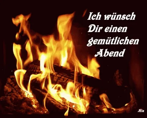 Ein loderndes Feuer im Kamin mit der Aufschrift: "Ich wünsche Dir einen gemütlichen Abend."