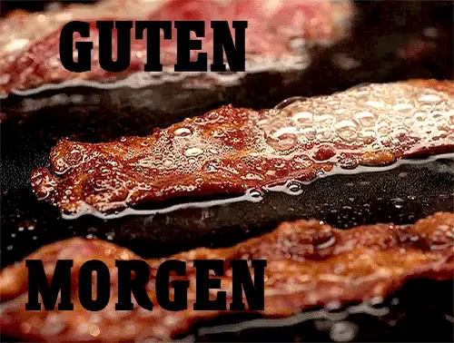 Baconstreifen braten in einer Pfanne, mit Blasen aus Öl. Schriftzug: "Guten Morgen".