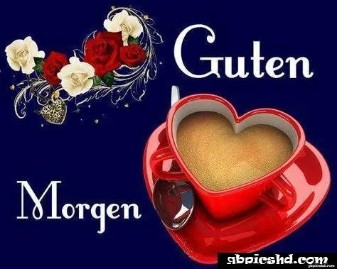 Herzförmige Tasse mit Kaffee und den Worten "Guten Morgen" auf dunklem Hintergrund.