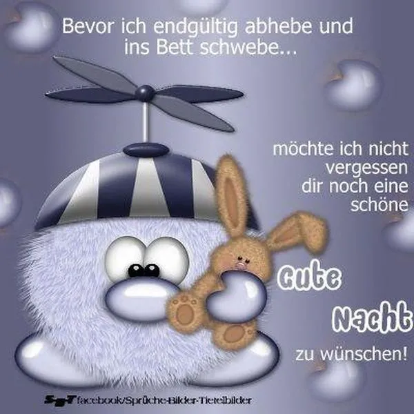 Romantischer Abendgruß Eine graue, flauschige Figur mit Propeller hält einen Hasen in der Hand und wünscht gute Nacht.