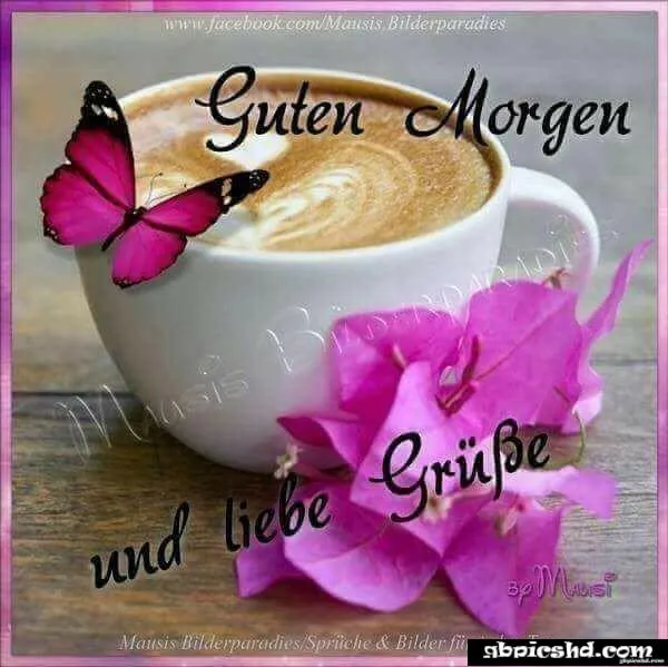 Eine Tasse Kaffee mit Schaum, einer Schmetterling und Blumen. Text: Guten Morgen und liebe Grüße.