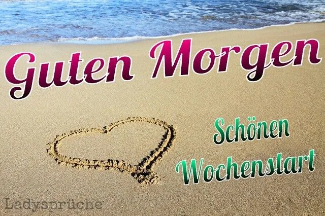 Text auf sandigem Strand mit Herzform: "Guten Morgen, schönen Wochenstart."