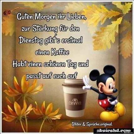 Ein Kaffeebecher neben Mickey Mouse und dem Text „Guten Morgen, einen schönen Tag!“